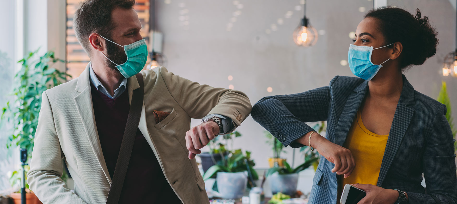 Business People Greeting During COVID 19 Pandemic, Elbow Bump