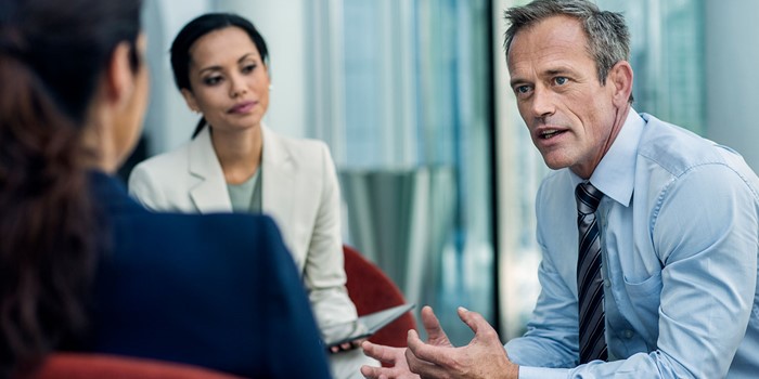 Businessman Discussing Strategy With Colleagues