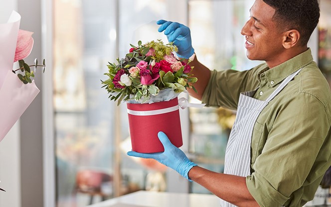 Male Florist Arranging Roses