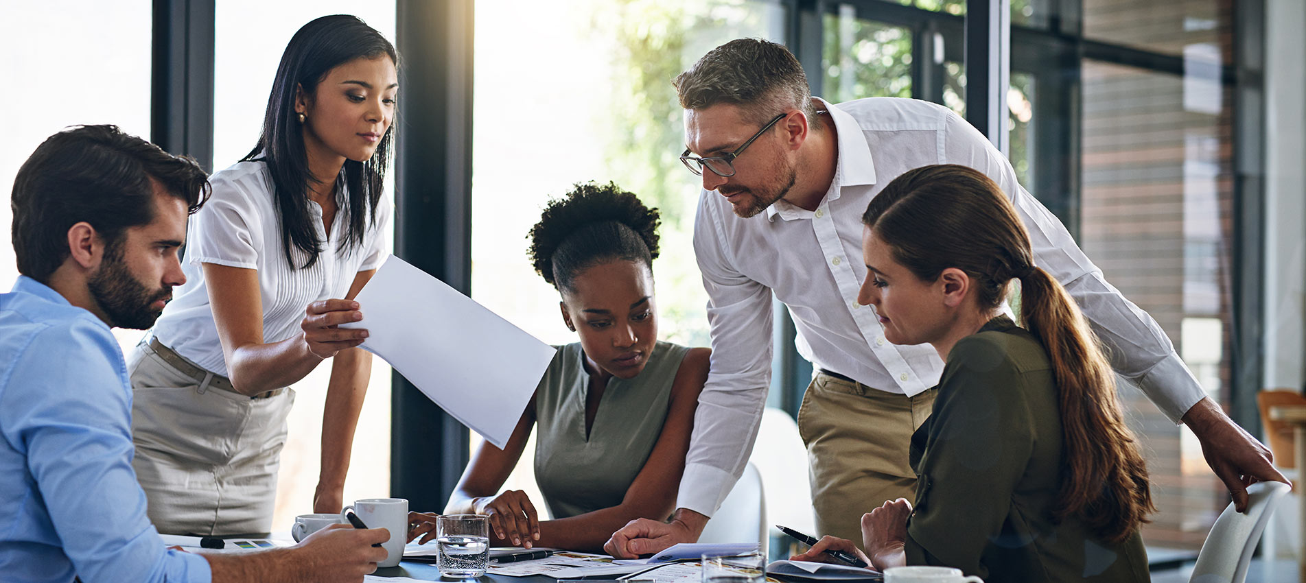 Group Of Businesspeople Having A Meeting In A Boardroom