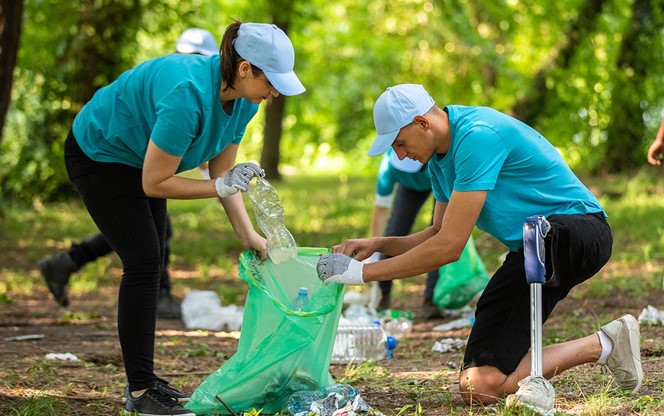 Happy Community Service People Cleaning Up The Park