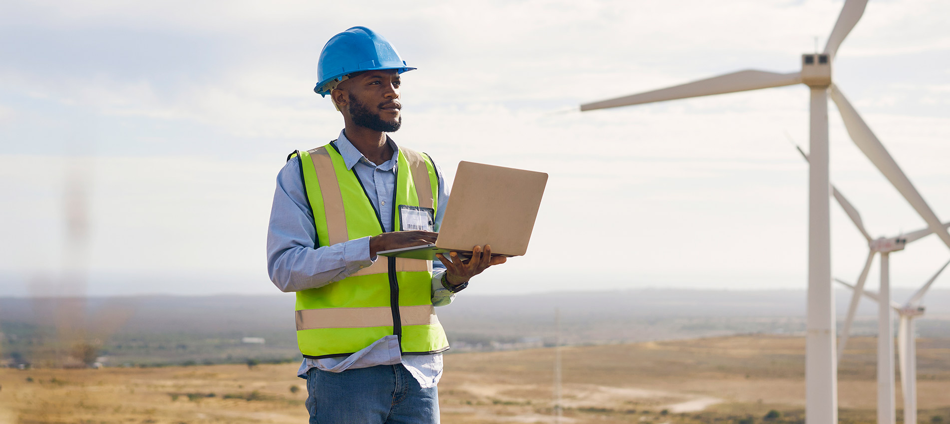 Engineer Man With Laptop On Farm For Renewable Energy Power And Electricity Outdoor