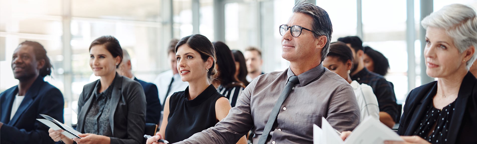Group Of Businesspeople Attending A Conference