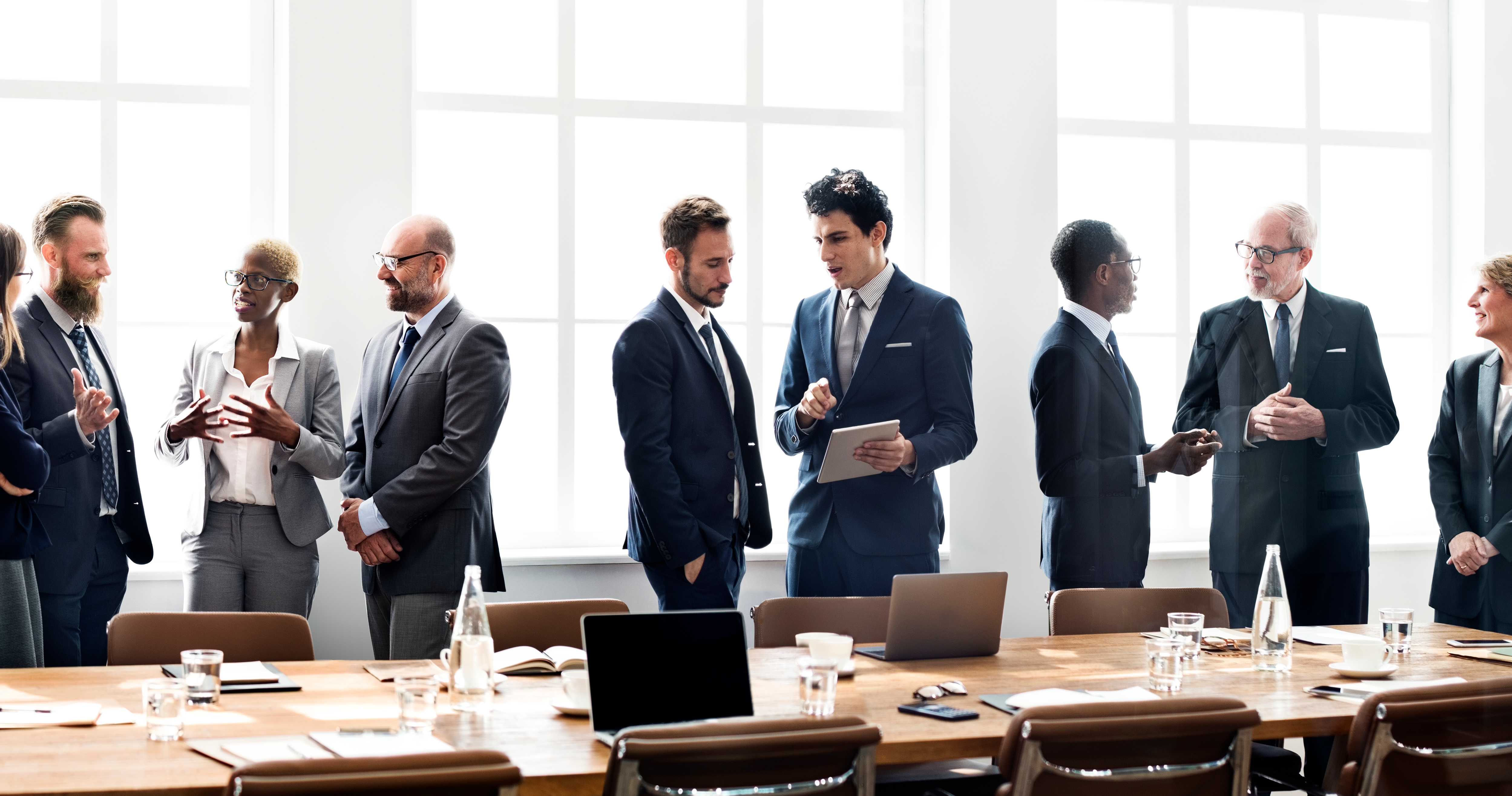 Group Of Buisness Men In A Meeting