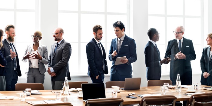 Group Of Buisness Men In A Meeting