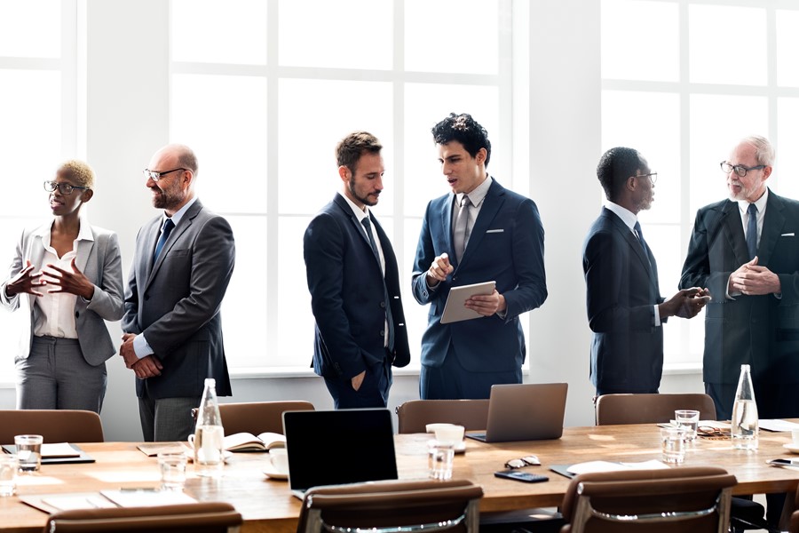 Group Of Buisness Men In A Meeting