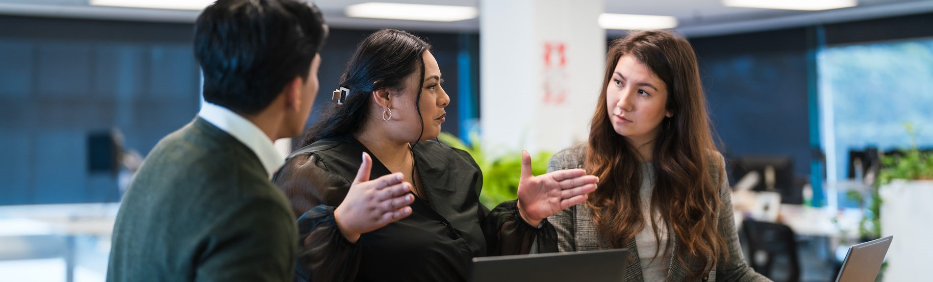 Business Partners Working On The Project In The Office Using Laptop