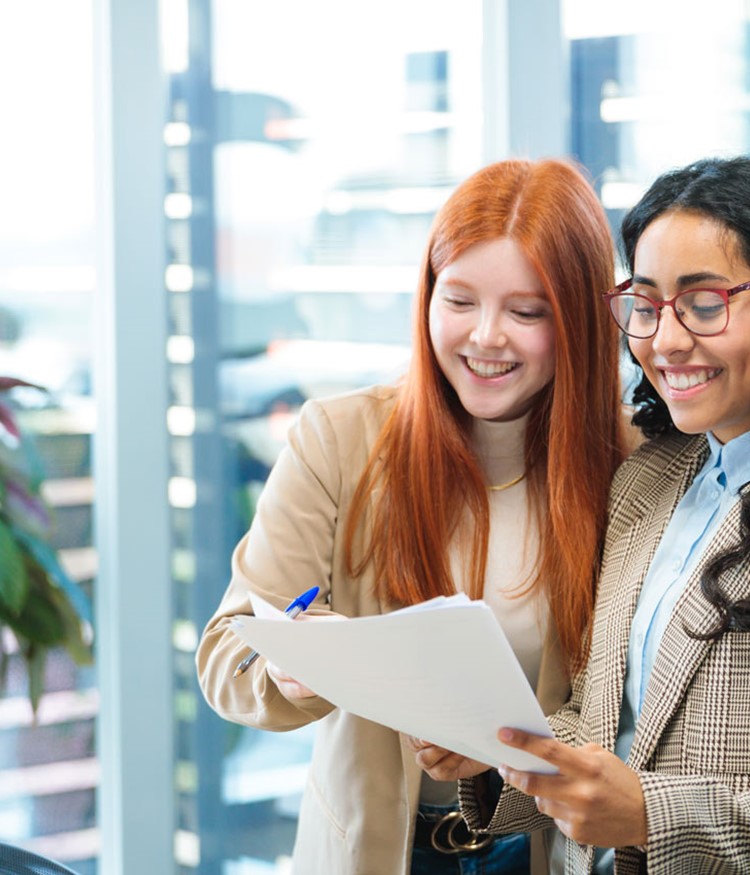 Young Professionals Collaborating On A Project In A Modern Office