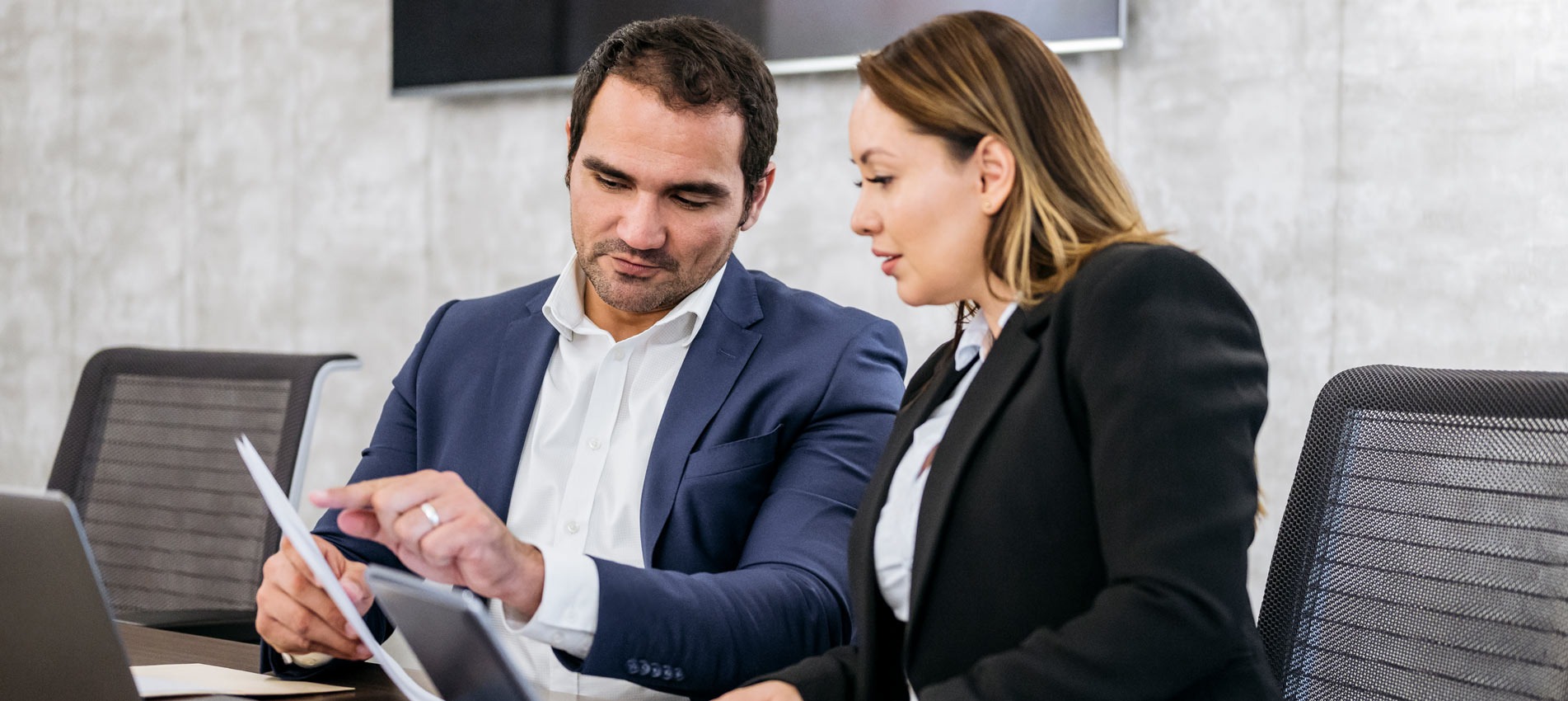 Investment Colleagues Discussing Over Market Report